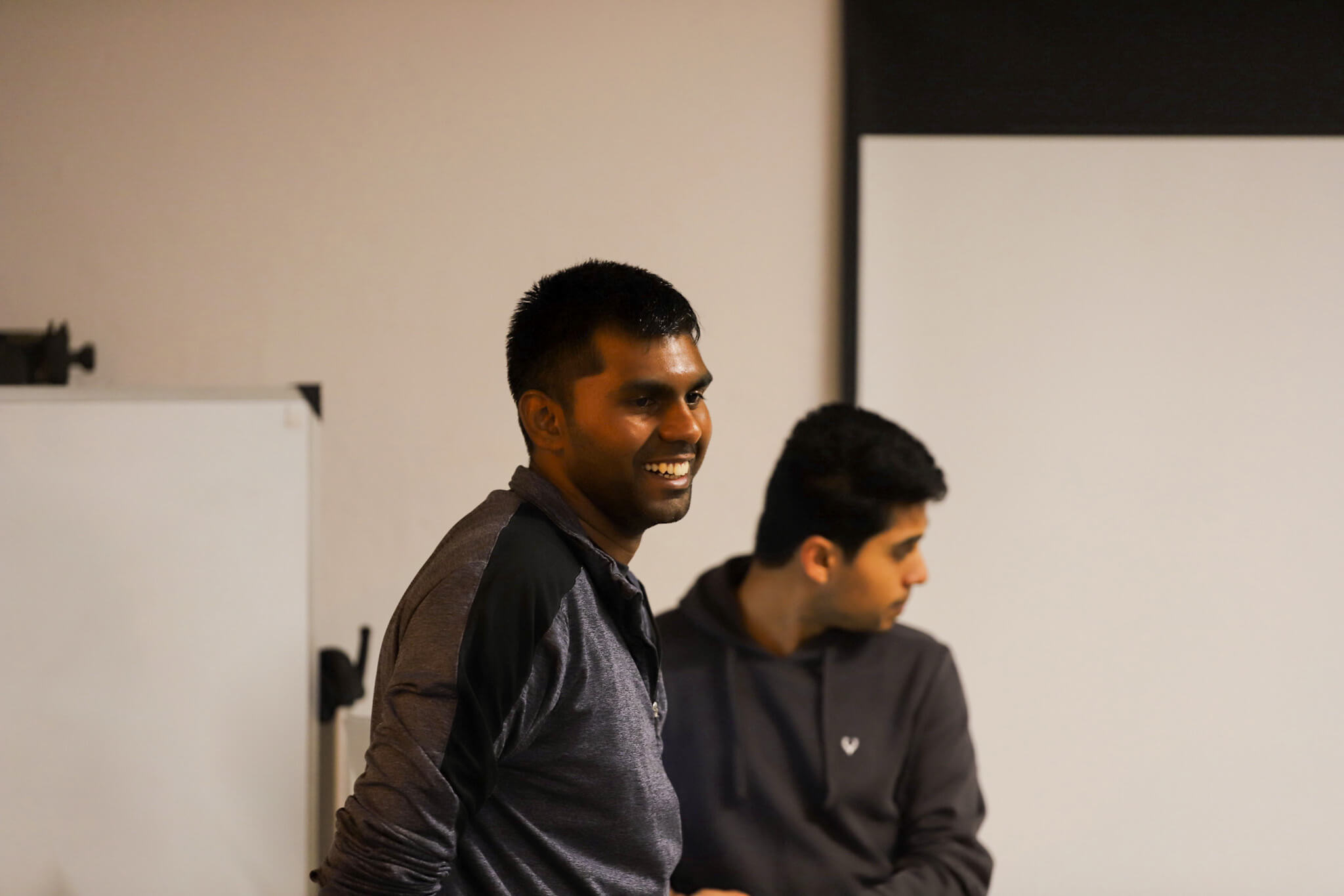 Participant smiling during pitch